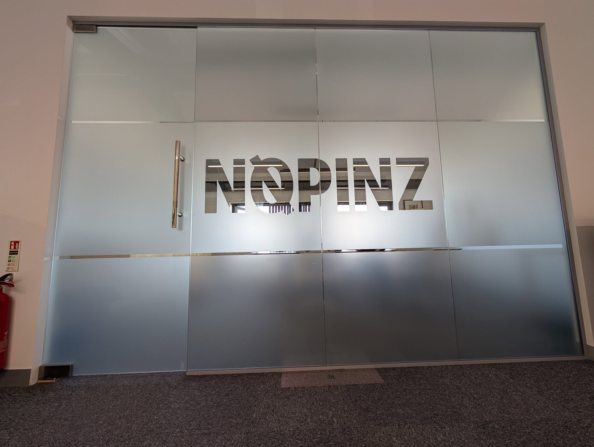 NOPINZ brushed metal reception signage
