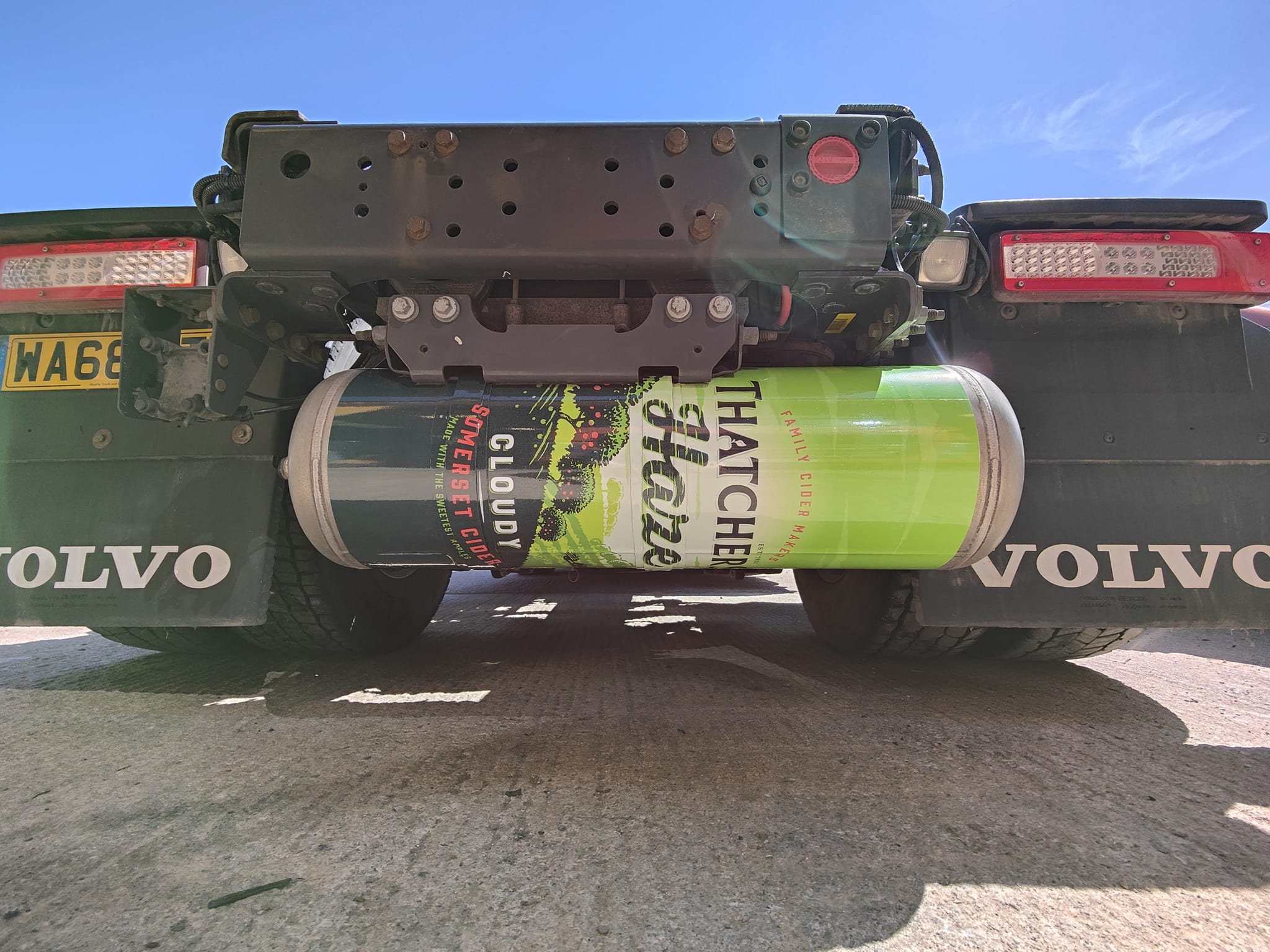 Branded fuel tank wrap on commercial vehicle